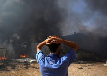 In pictures: Fear and mourning as Israel-Gaza violence rages on