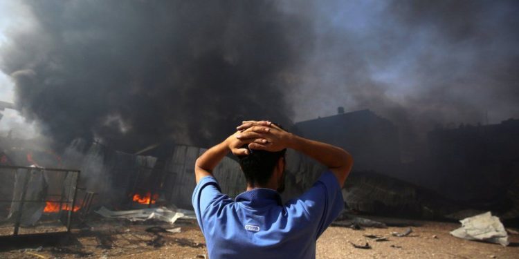In pictures: Fear and mourning as Israel-Gaza violence rages on