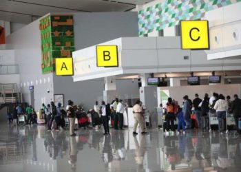 Nigeria searches for 90 travellers over Covid breach