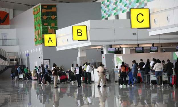 Nigeria searches for 90 travellers over Covid breach