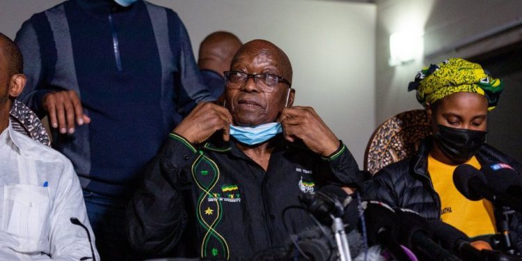 Jacob Zuma: South Africa's former president hands himself over to police