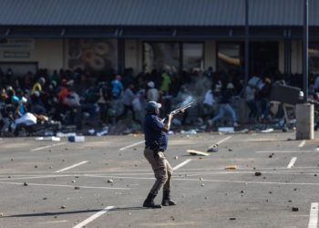 South Africa riots: Looting and shooting in Durban