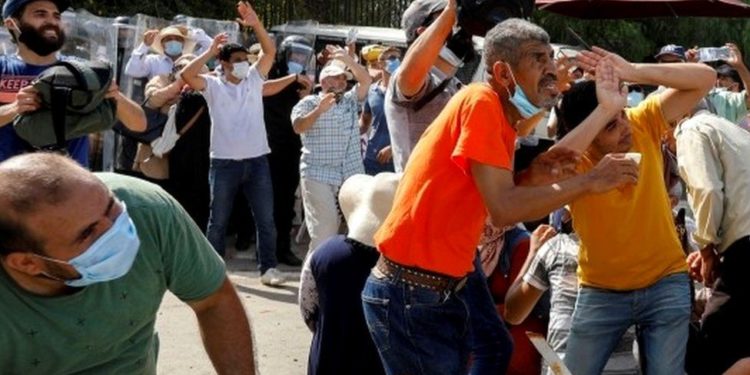 Tunisia's PM sacked after violent Covid protests