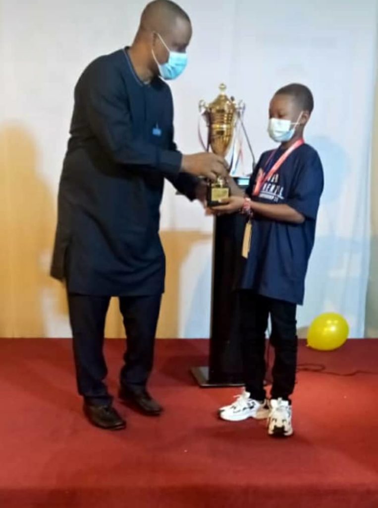 University of Cape Coast Basic school pupil bags an award in a spelling B competition in Dubai