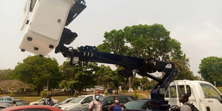 UCC Mgt procures area bucket to help maintain street lights on campus