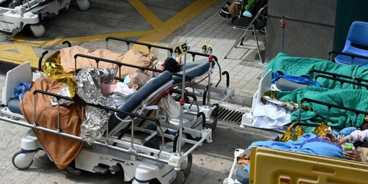 Covid: Hong Kong's hospitals overwhelmed amid spike in cases