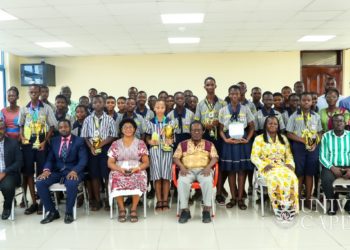 UCC Spelling Bee winners present awards to management