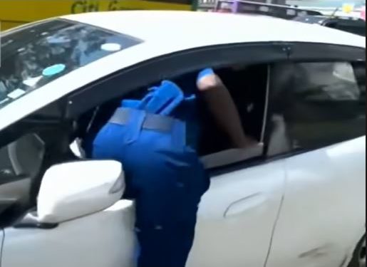 Kenyan policeman filmed ejecting driver from car