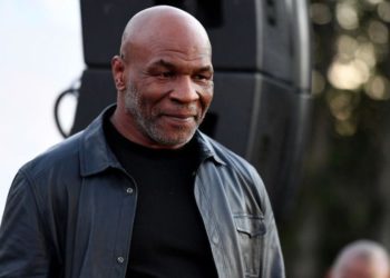Mike Tyson punched plane passenger 'after bottle thrown'