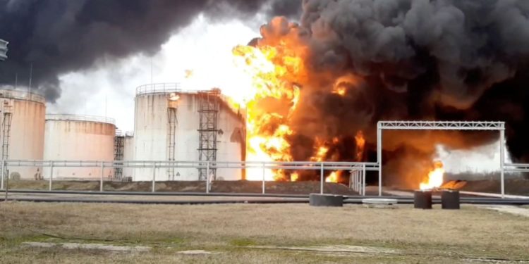 Ukraine denies attacking fuel depot inside Russia, mayor says fire almost out