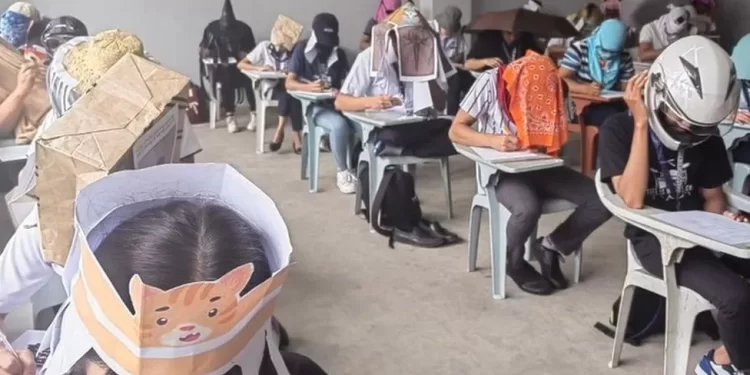 Philippines: Student 'anti-cheating' exam hats go viral