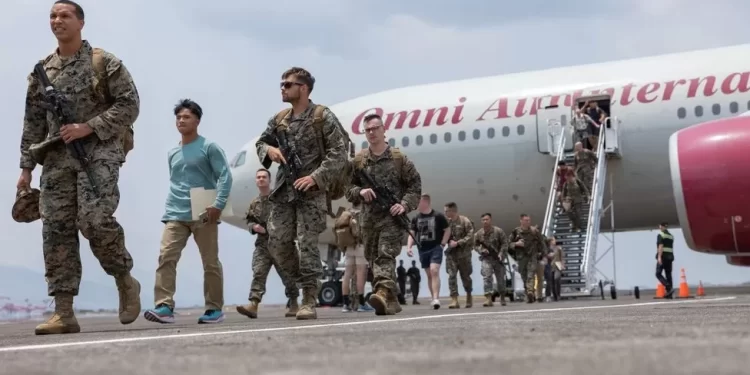 US and Philippines begin largest-ever drills after China exercises