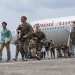 US and Philippines begin largest-ever drills after China exercises