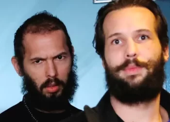 Andrew Tate charged with rape and human trafficking