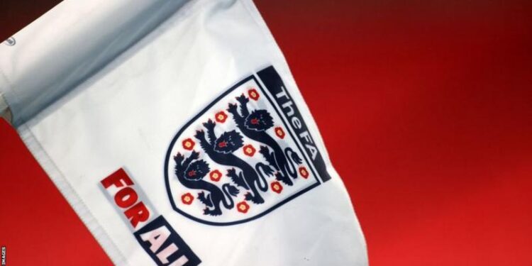 The Football Association says it is "working to find a resolution" after a transgender player stopped playing football when rival clubs refused to play against her.