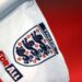 The Football Association says it is "working to find a resolution" after a transgender player stopped playing football when rival clubs refused to play against her.