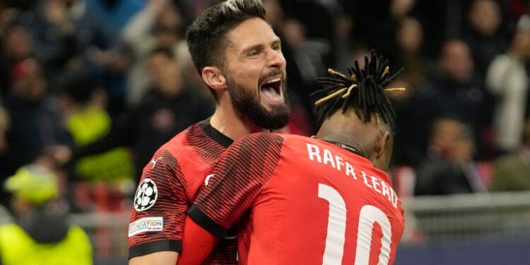 Giroud's header earns Milan crucial win over PSG