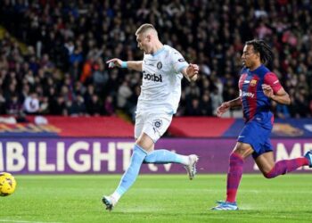 Girona top La Liga table after famous win at Barcelona