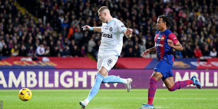 Girona top La Liga table after famous win at Barcelona