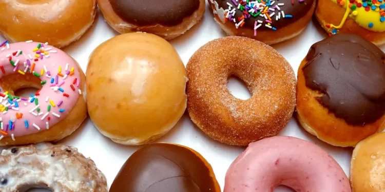 Woman arrested over theft of doughnut-laden van