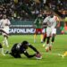 Toothless Cameroon held to draw by 10-man Guinea