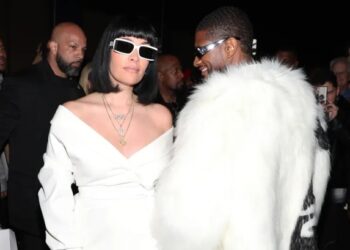 Usher marries longtime girlfriend in Las Vegas hours after the Super Bowl with Elvis Presley impersonator officiating