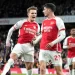 Arsenal return top with victory over Luton