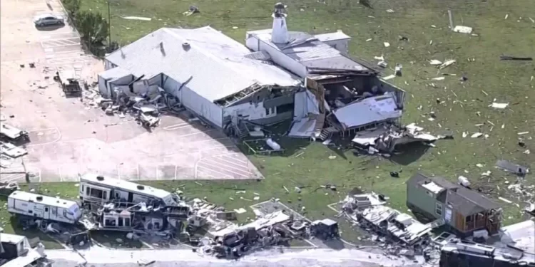Tornadoes and storms leave 18 dead across central US