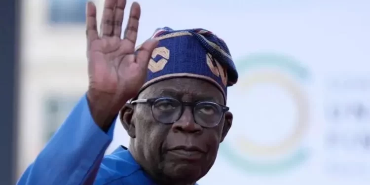 Nigeria's President Tinubu falls over during ceremony