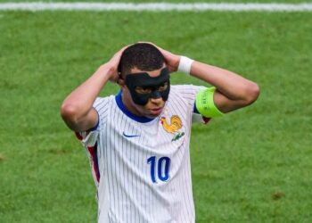 France's 'luck' continues as Mbappe struggles with mask