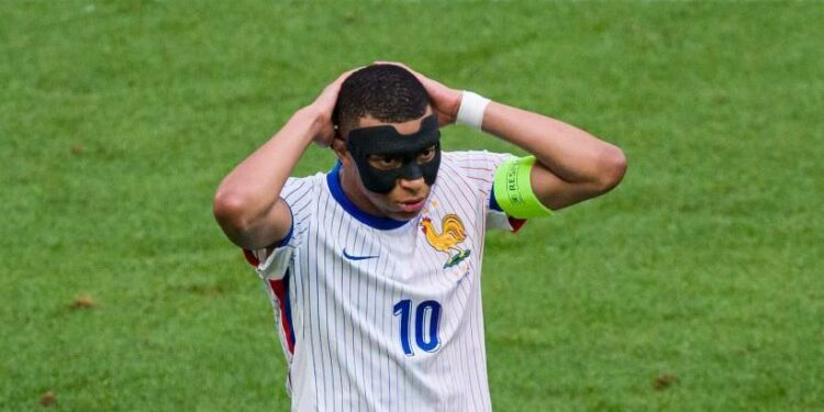 France's 'luck' continues as Mbappe struggles with mask