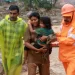 Ninety-three killed, dozens trapped in India landslides