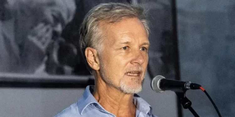 Award-winning photographer found stabbed to death; son charged with murder