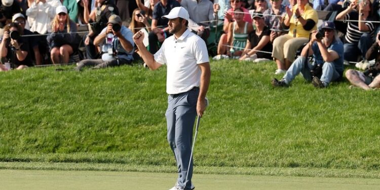 Scottie Scheffler retains Memorial crown despite Shane Lowry's late struggles.